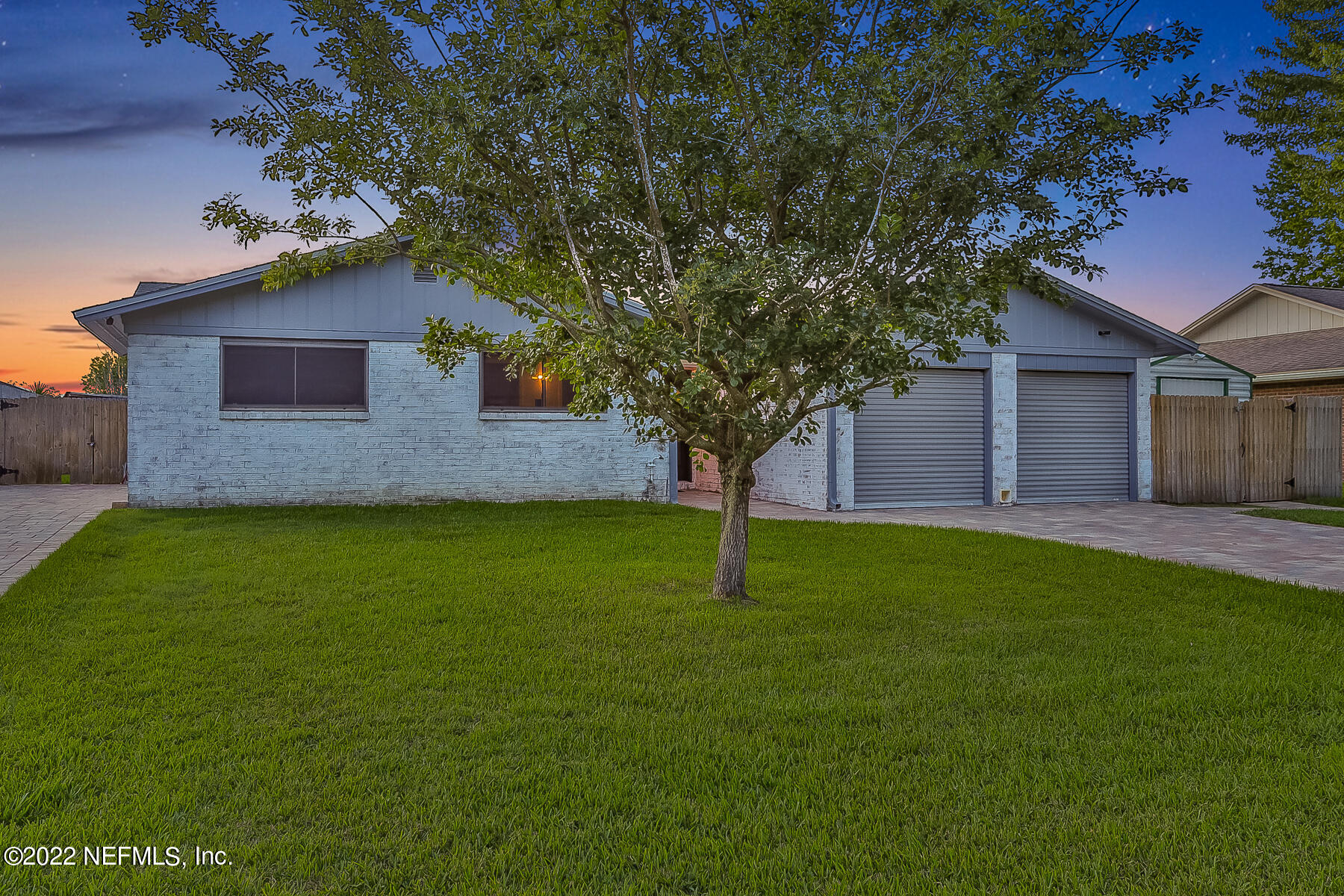 2198 Carter Braxton Road Orange Park, FL 32073 - Photo 3 of 33 a front view of a house with a garden