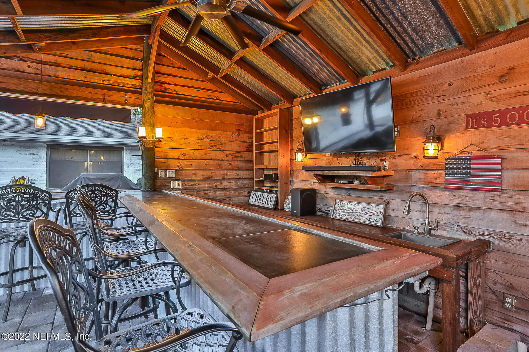 2198 Carter Braxton Road Orange Park, FL 32073 - Photo 4 of 33 a outdoor dining space with furniture and outdoor view