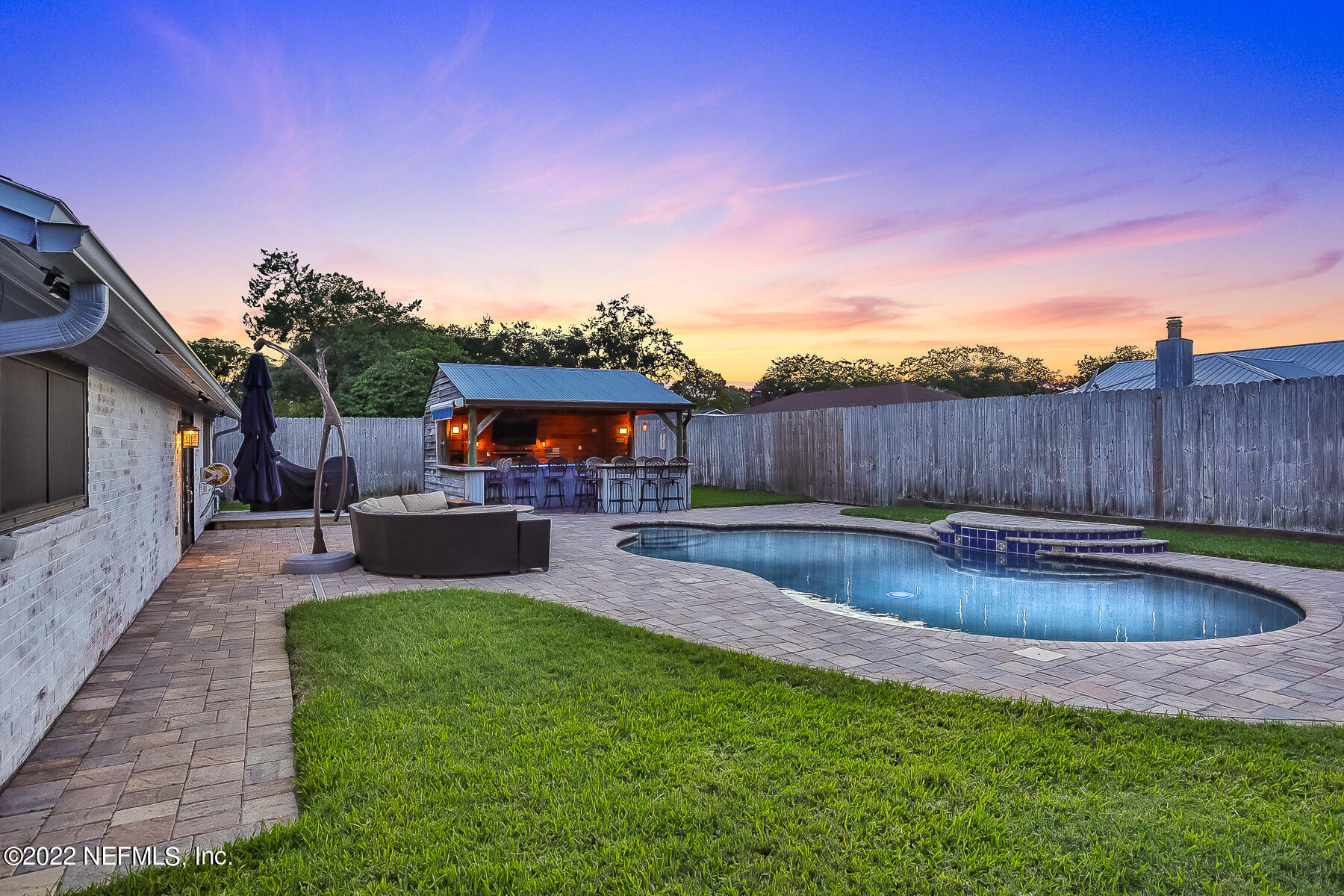 2198 Carter Braxton Road Orange Park, FL 32073 - Photo 7 of 33 a swimming pool with outdoor seating and yard