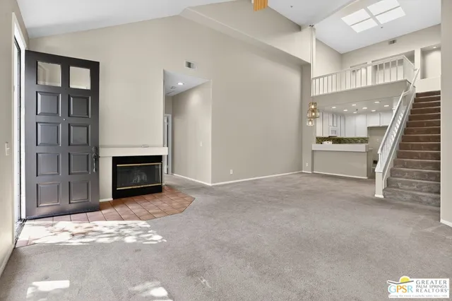a view of a livingroom with a fireplace