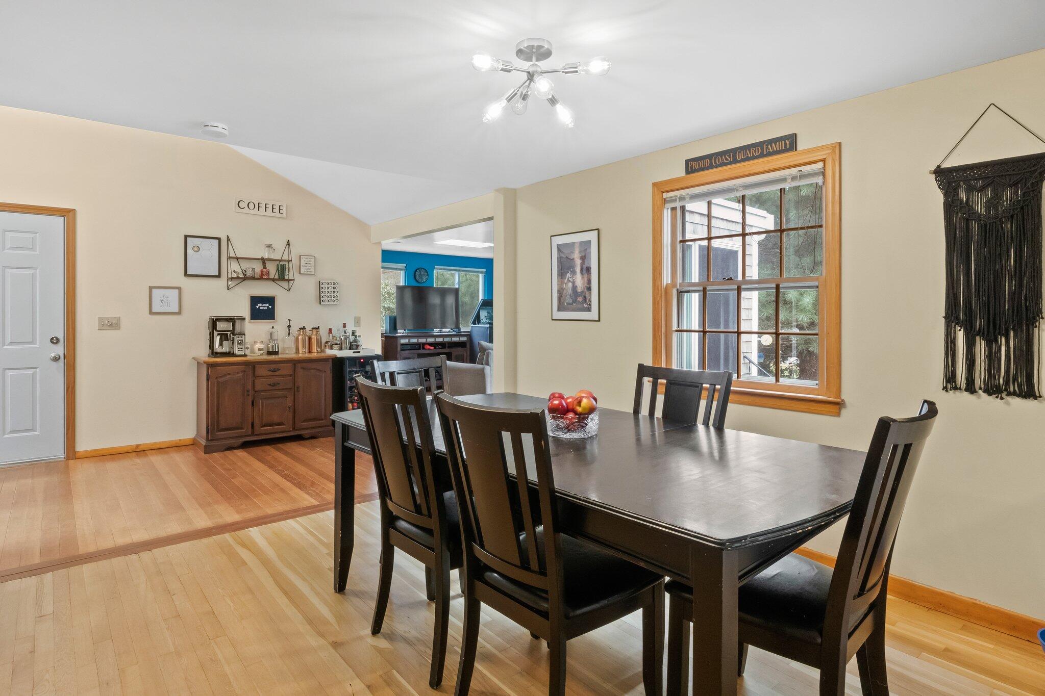 3 Lietrim Circle Centerville, MA 02632 - Photo 12 of 42 a view of a dining room with furniture and chandelier