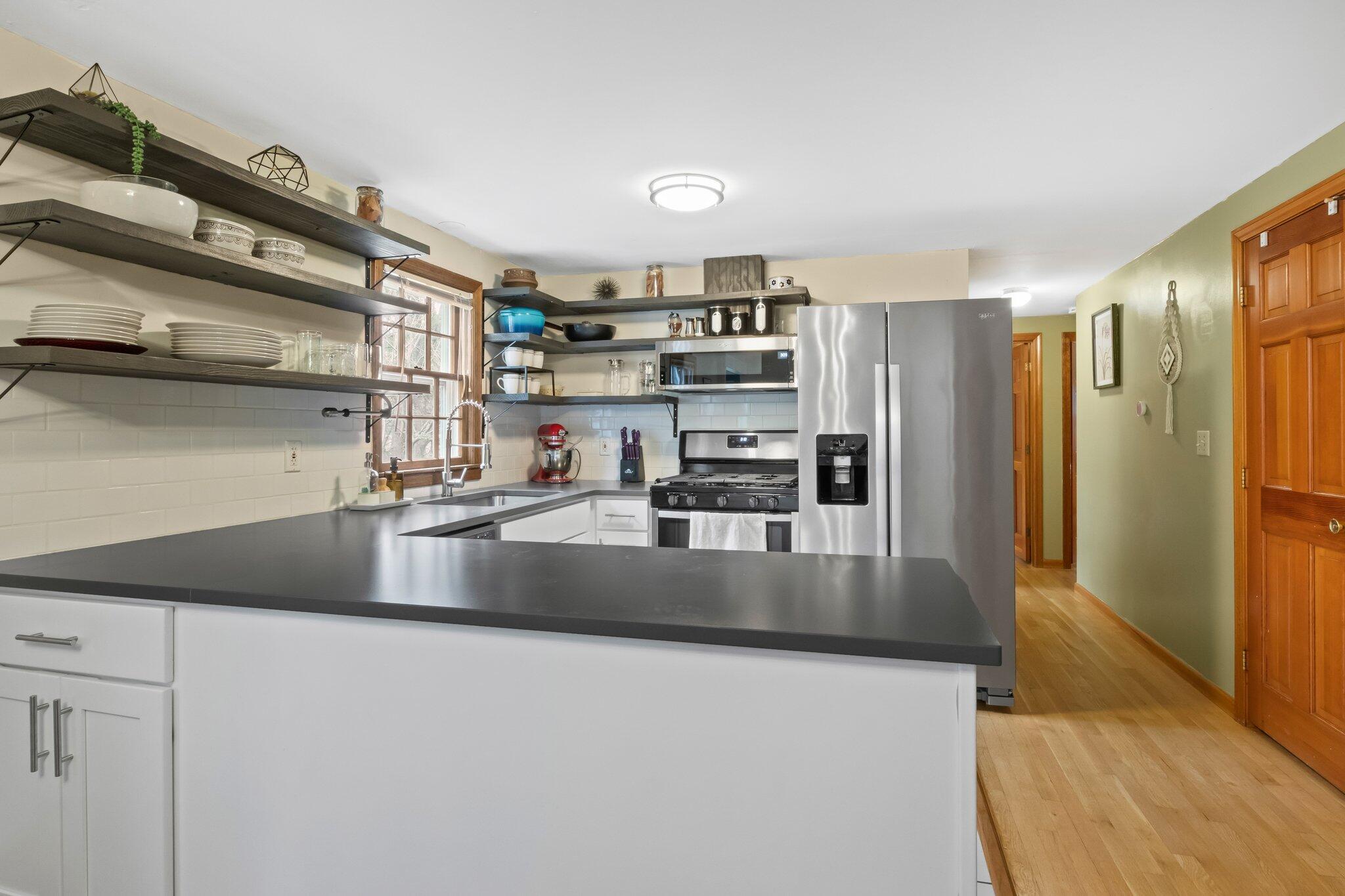 3 Lietrim Circle Centerville, MA 02632 - Photo 13 of 42 a view of a kitchen with stainless steel appliances granite countertop a refrigerator and a sink