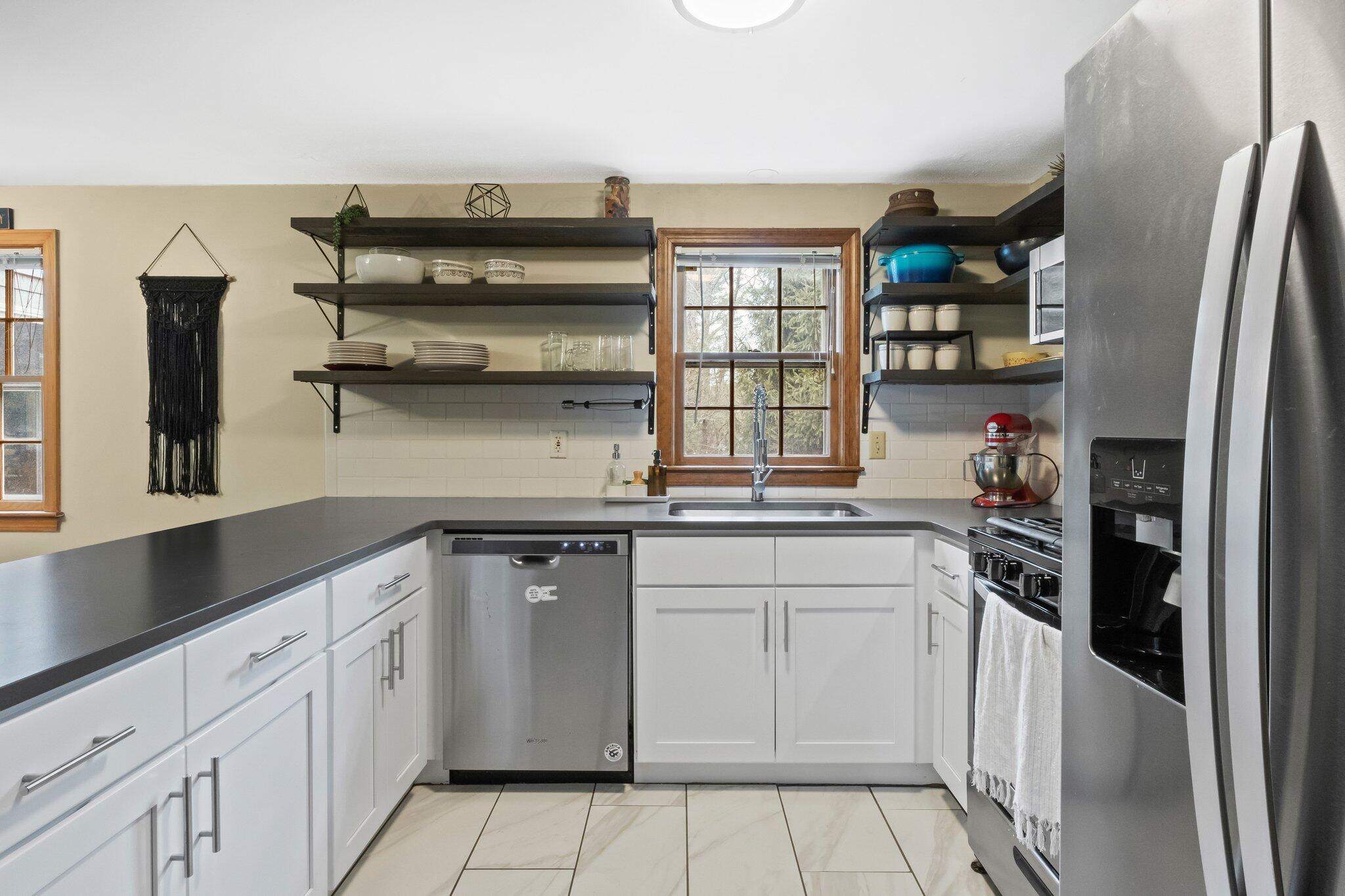3 Lietrim Circle Centerville, MA 02632 - Photo 14 of 42 a kitchen with stainless steel appliances granite countertop a sink and cabinets
