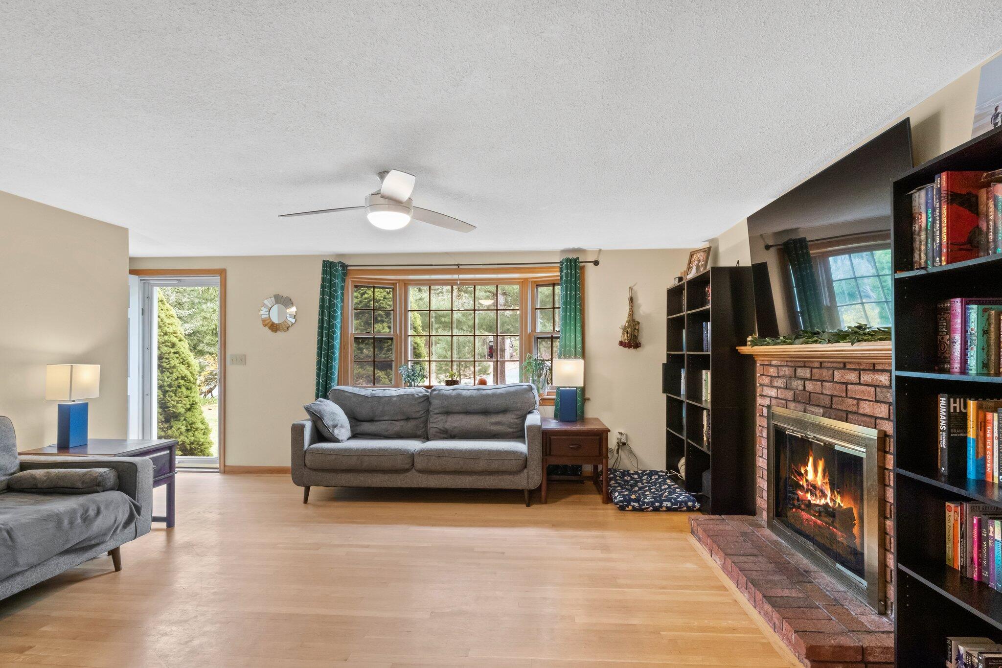 3 Lietrim Circle Centerville, MA 02632 - Photo 16 of 42 a living room with furniture window and book shelf