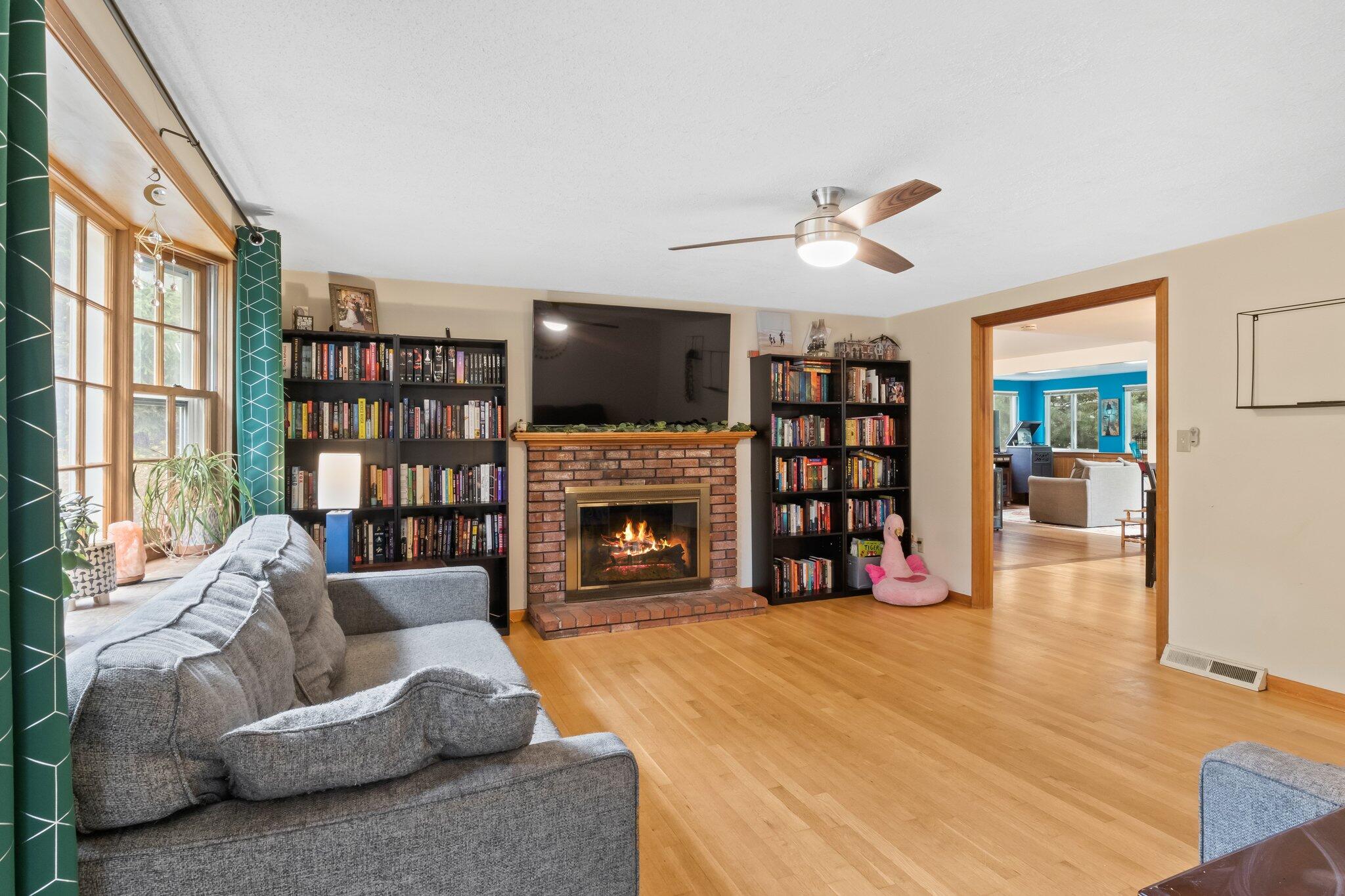 3 Lietrim Circle Centerville, MA 02632 - Photo 18 of 42 a living room with fireplace furniture and a flat screen tv