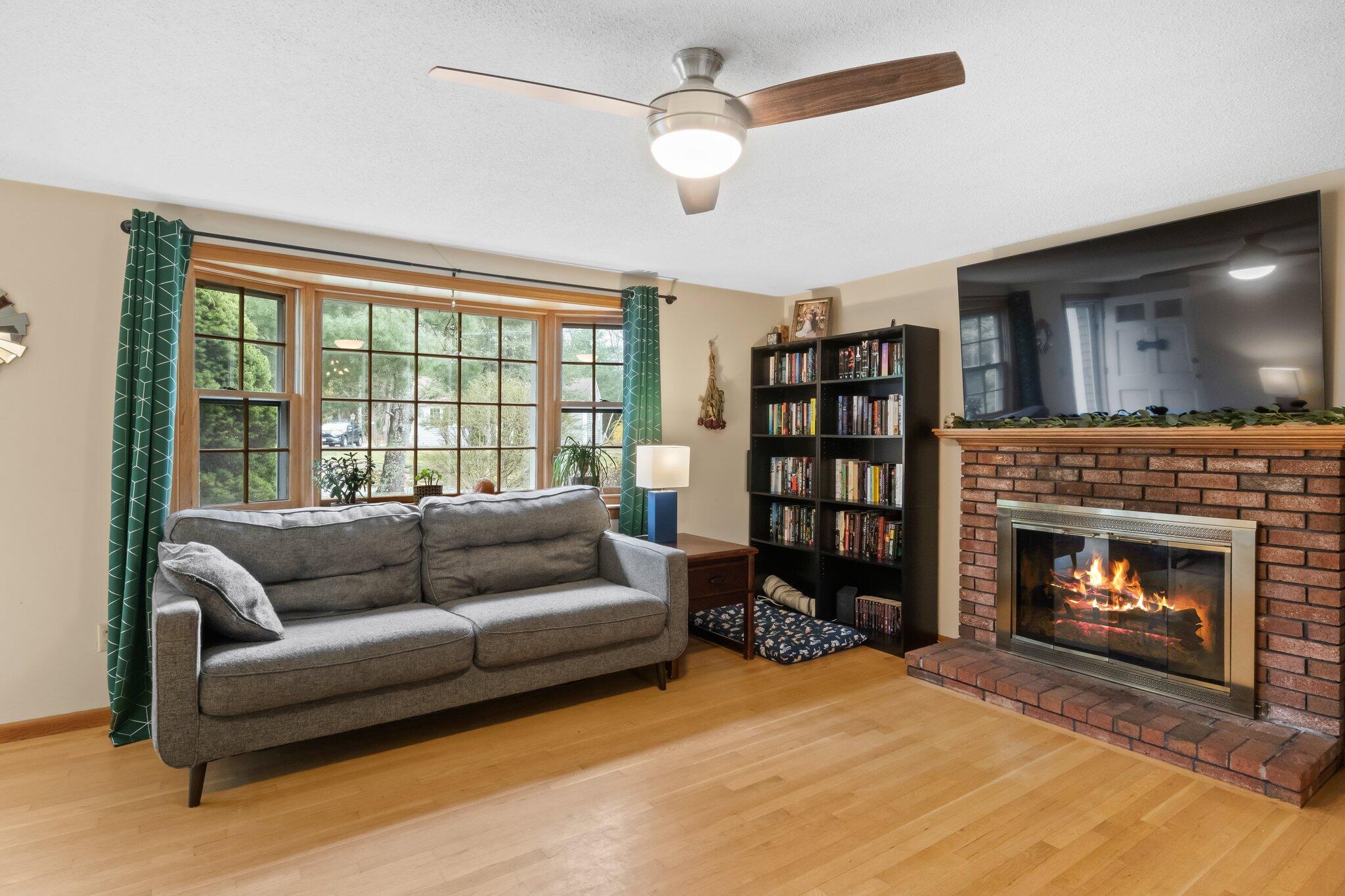 3 Lietrim Circle Centerville, MA 02632 - Photo 20 of 42 a living room with furniture and a fireplace