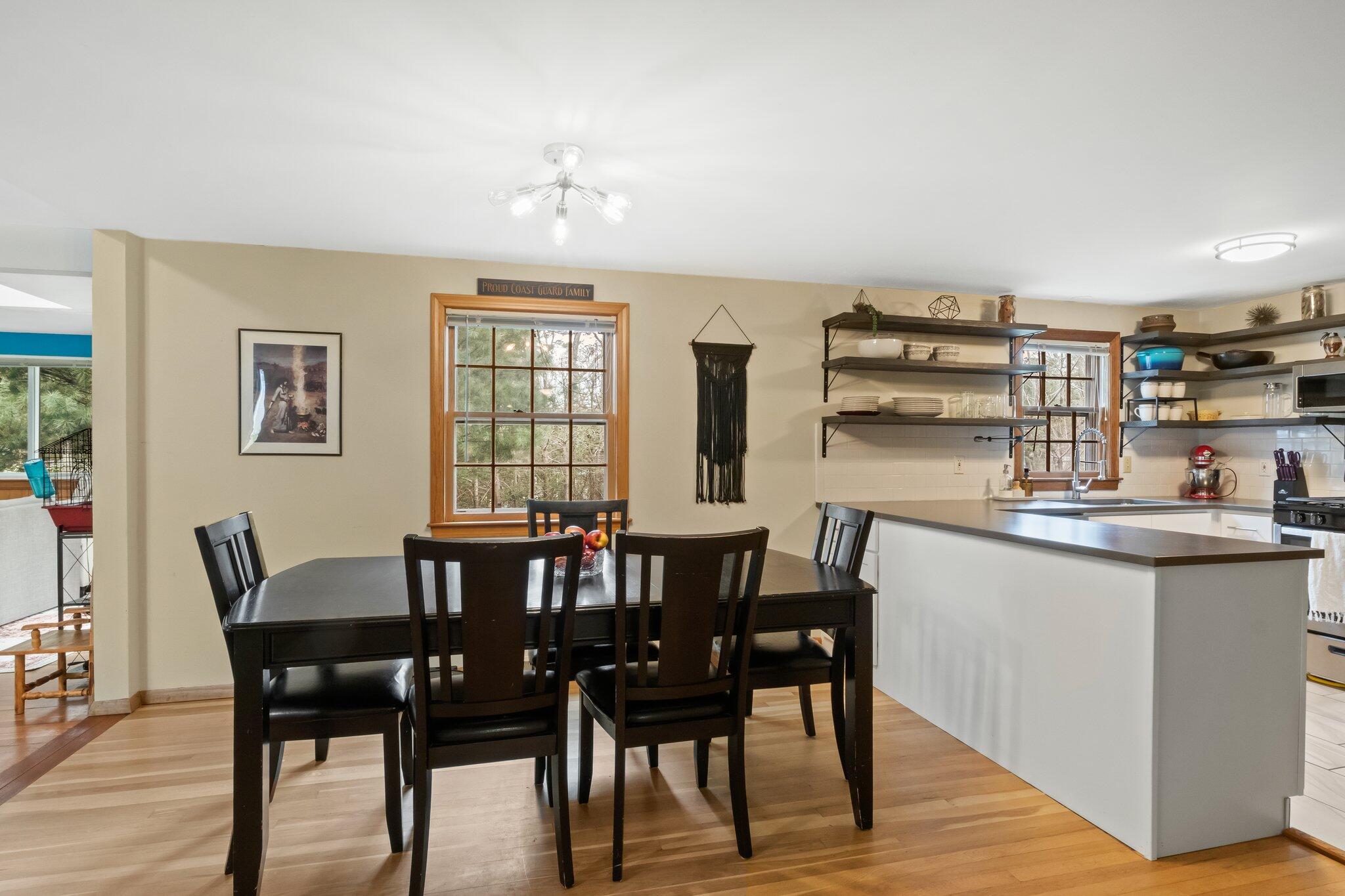 3 Lietrim Circle Centerville, MA 02632 - Photo 21 of 42 a view of a dining room with furniture and wooden floor