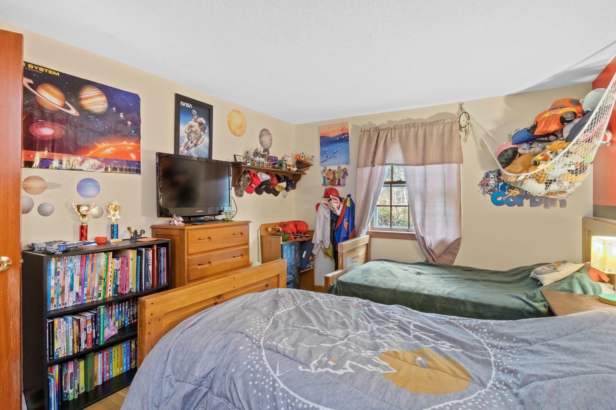 3 Lietrim Circle Centerville, MA 02632 - Photo 27 of 42 a bed room with a bed and a flat screen tv