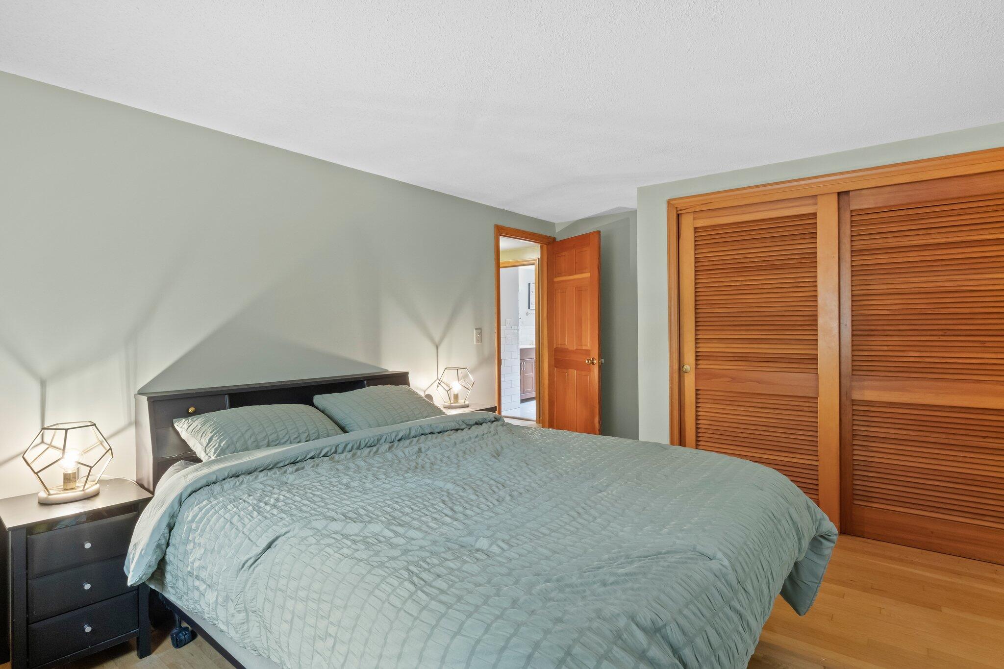 3 Lietrim Circle Centerville, MA 02632 - Photo 29 of 42 a bedroom with a large bed and two windows