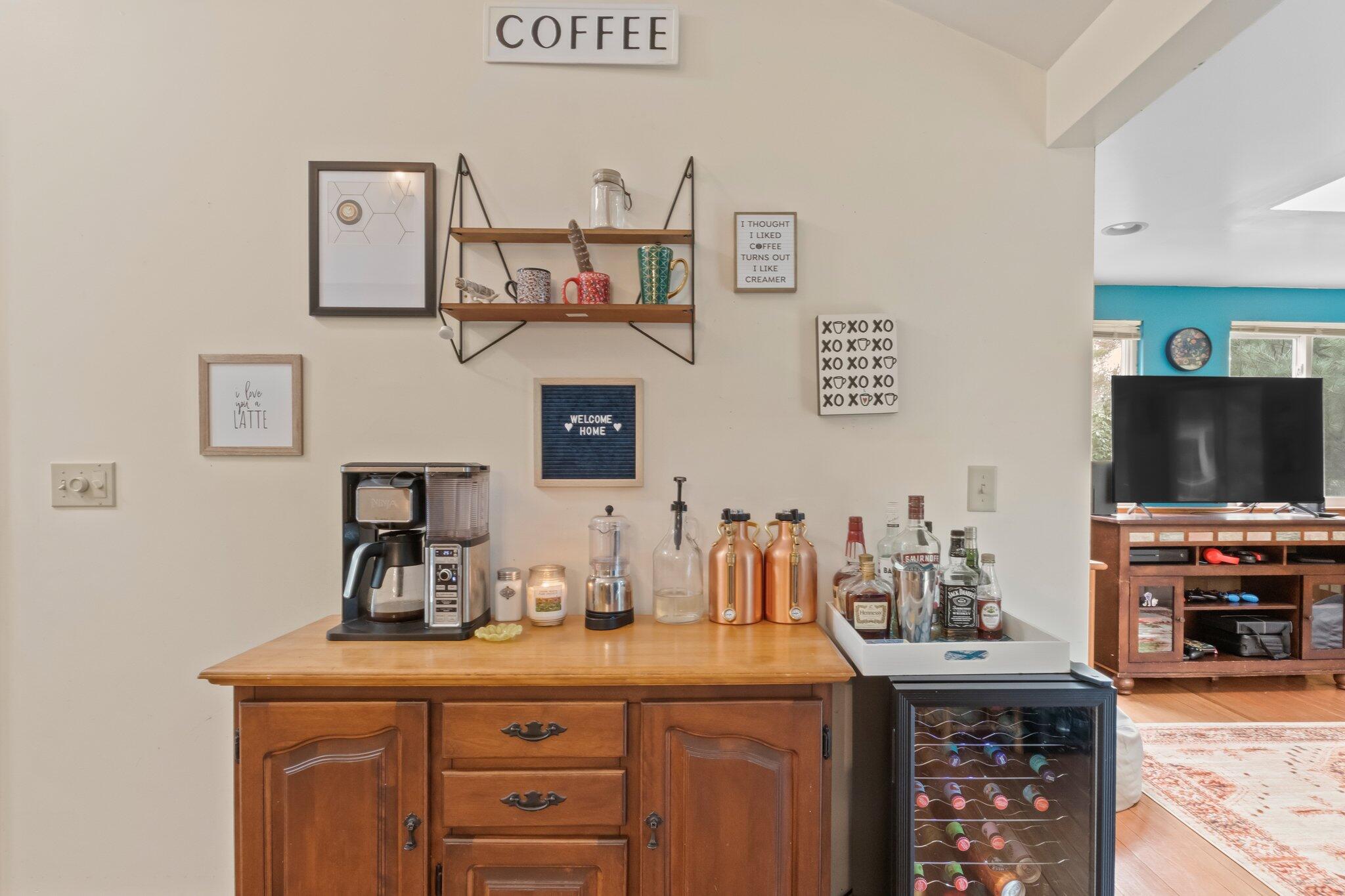 3 Lietrim Circle Centerville, MA 02632 - Photo 9 of 42 a room with a sink and a flat screen tv