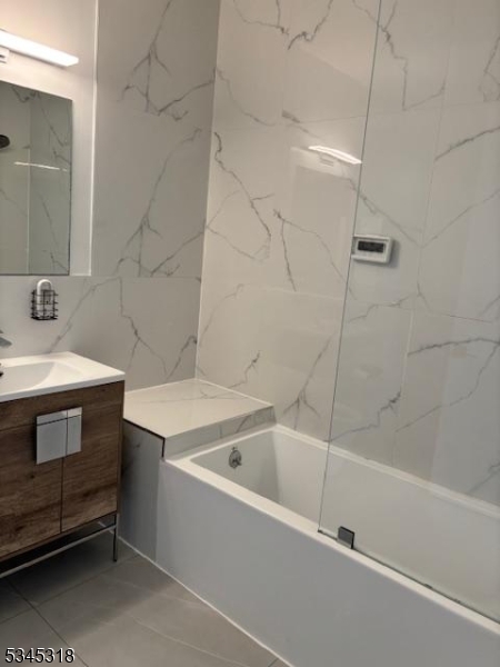 a bathroom with a sink and a bathtub