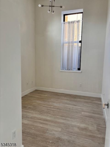 29 Broadway, Unit 2 3 Passaic, NJ 07055 - Photo 3 of 9 a view of a small space with window