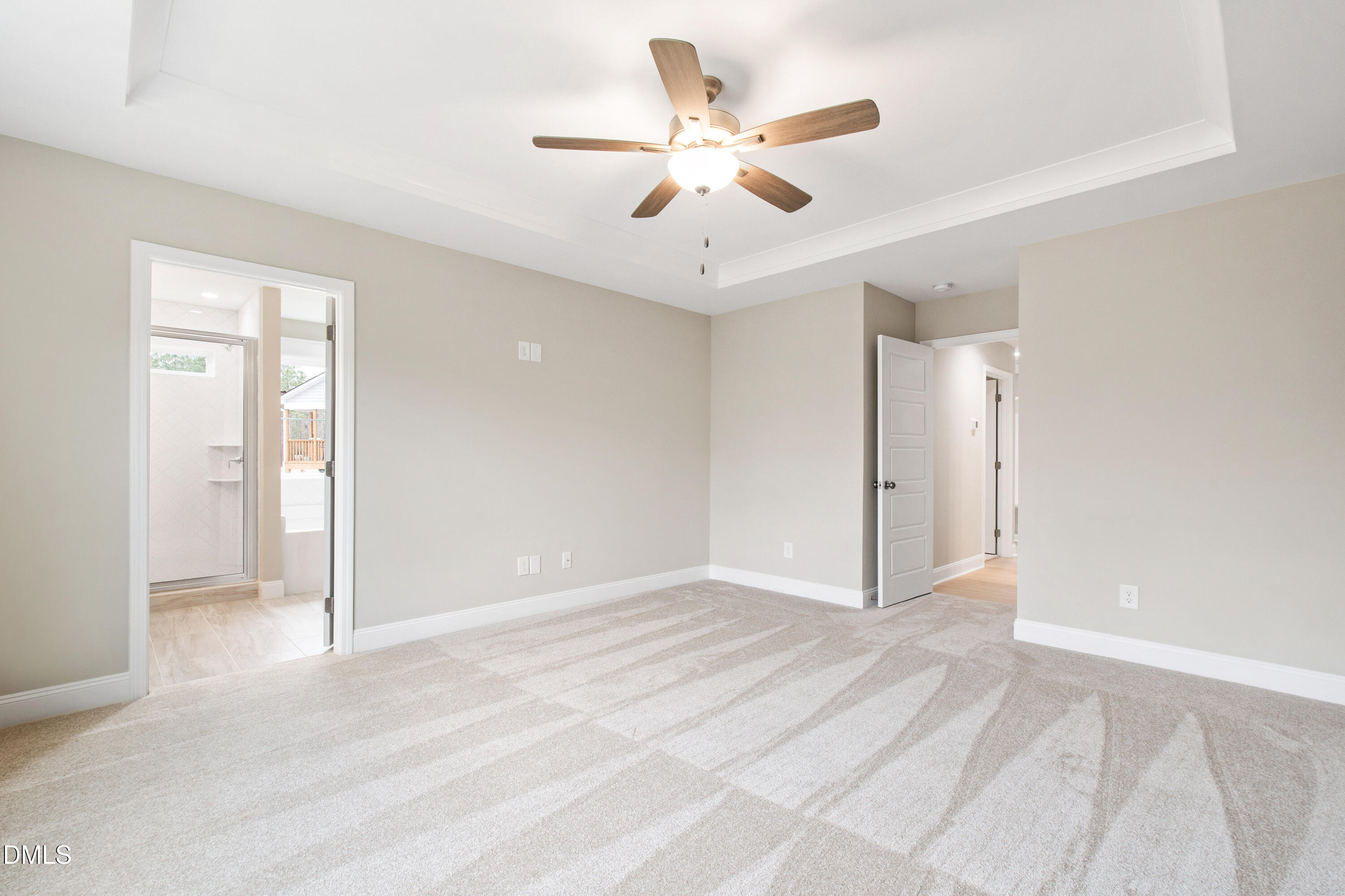 77 Falls Riv Court Broadway, NC 27505 - Photo 19 of 39 wooden floor in an empty room with a ceiling fan