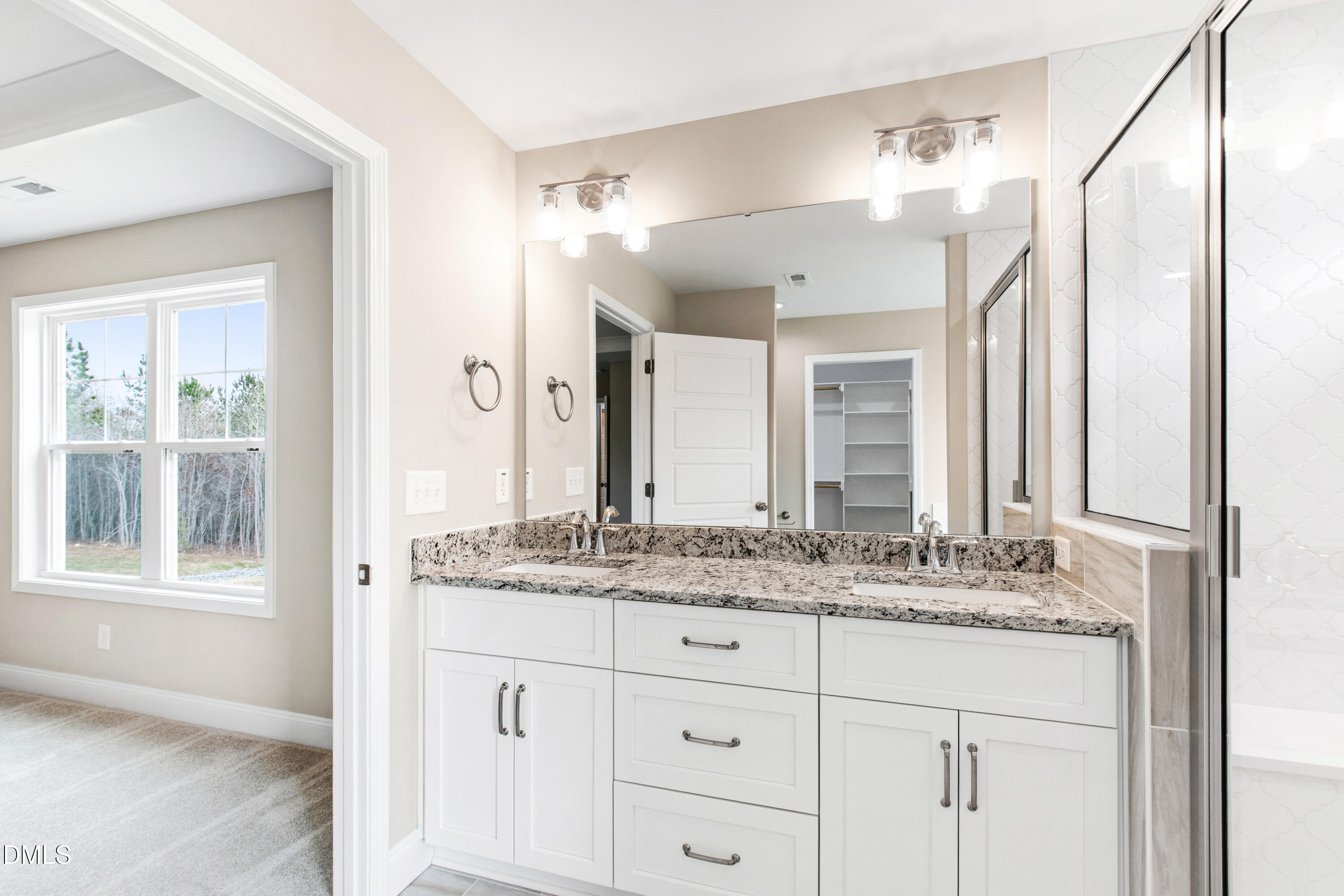 77 Falls Riv Court Broadway, NC 27505 - Photo 21 of 39 a bathroom with a granite countertop sink mirror and double