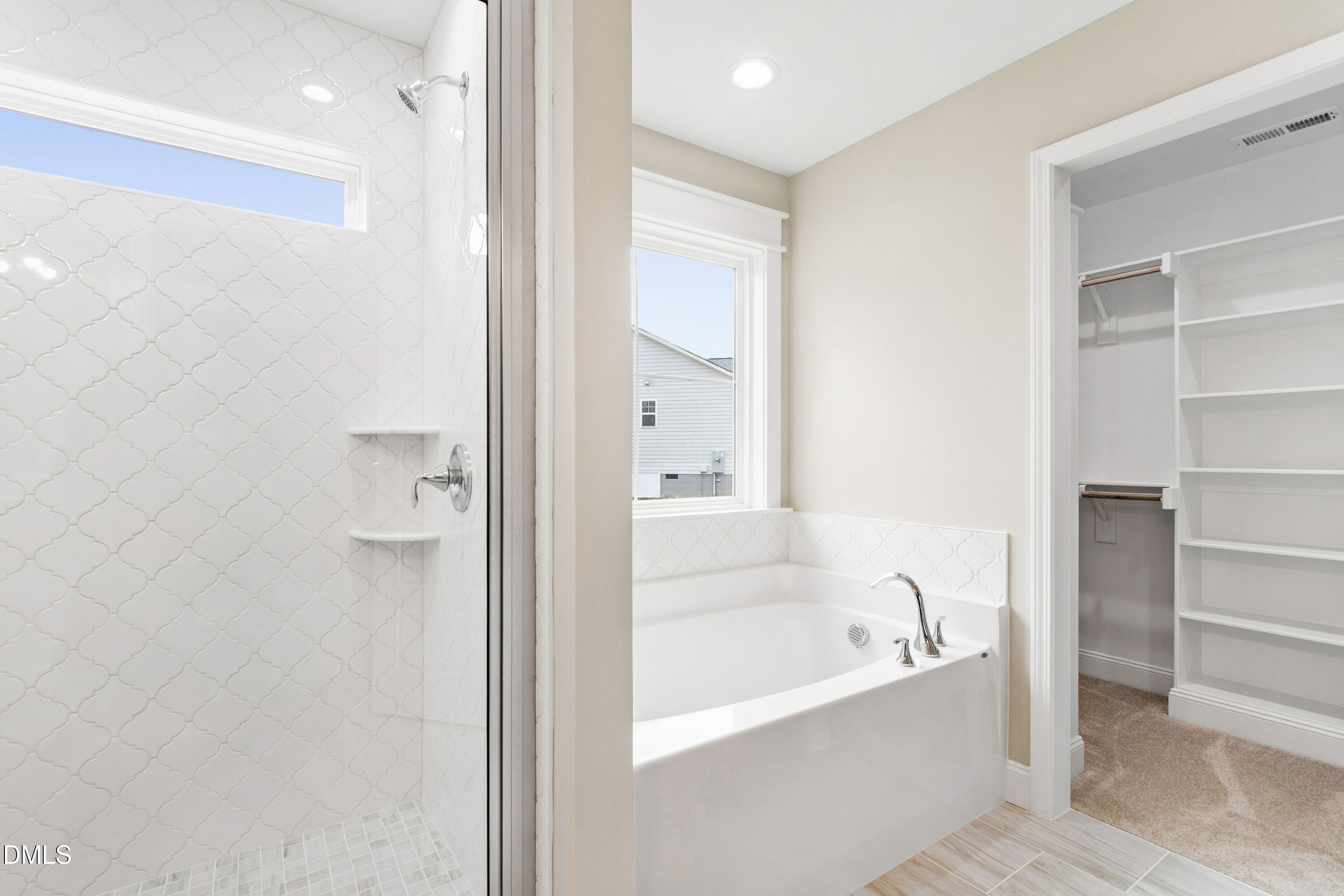77 Falls Riv Court Broadway, NC 27505 - Photo 22 of 39 a bathroom with a bathtub and shower