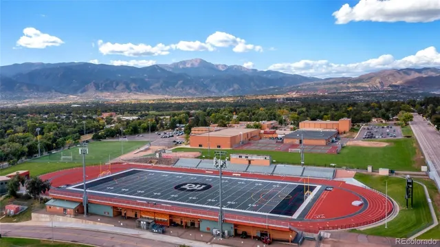 an aerial view of a chairs and table on the terrace