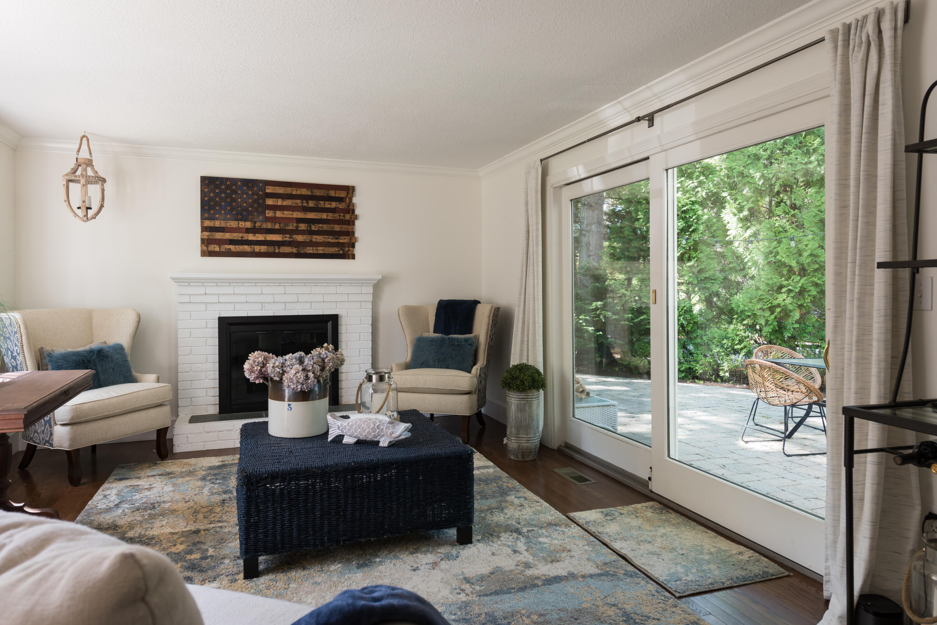 7 Sand Dollar Lane Mashpee, MA 02649 - Photo 12 of 33 a living room with furniture a large window and a fireplace