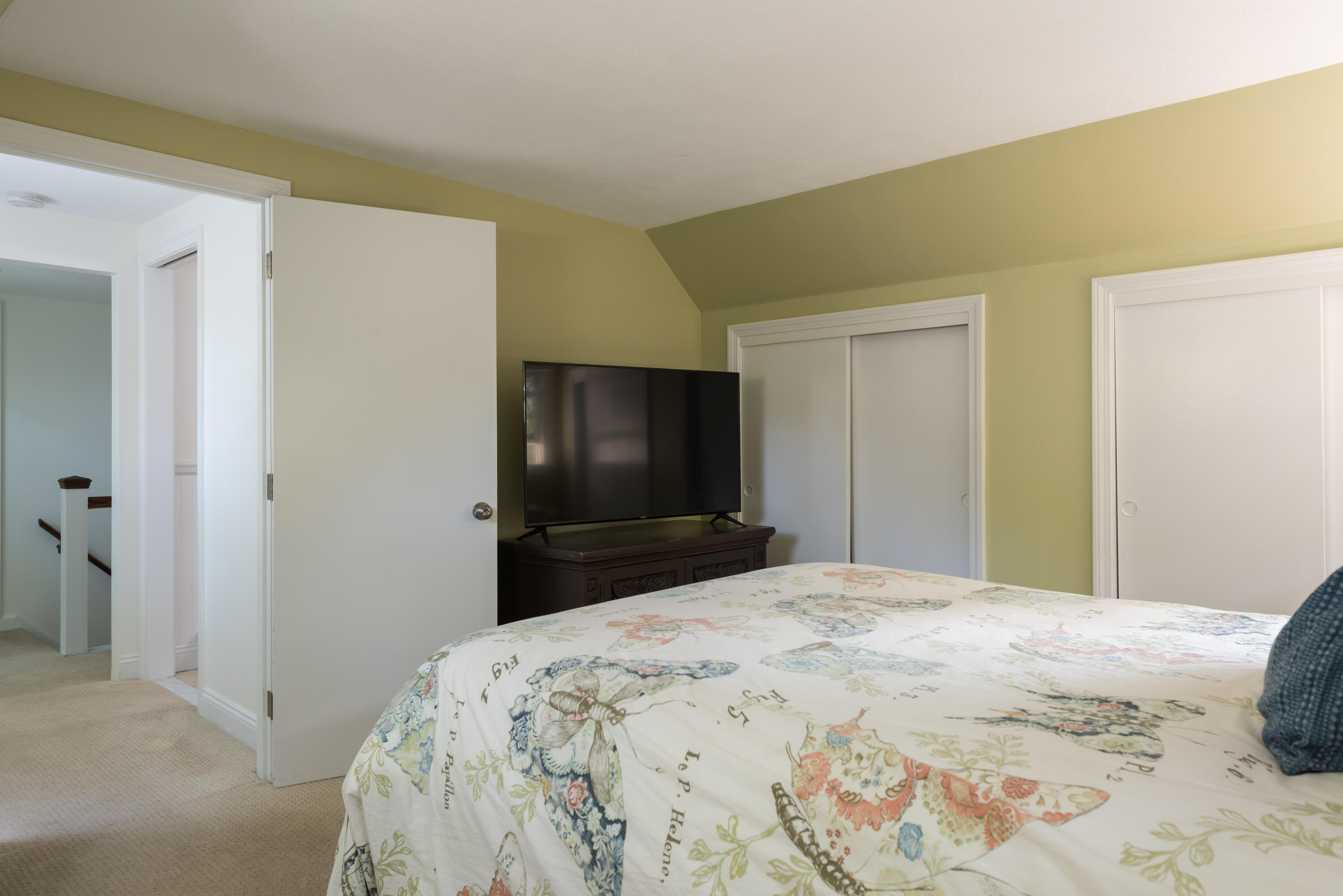 7 Sand Dollar Lane Mashpee, MA 02649 - Photo 19 of 33 a bedroom with a bed and a television in it