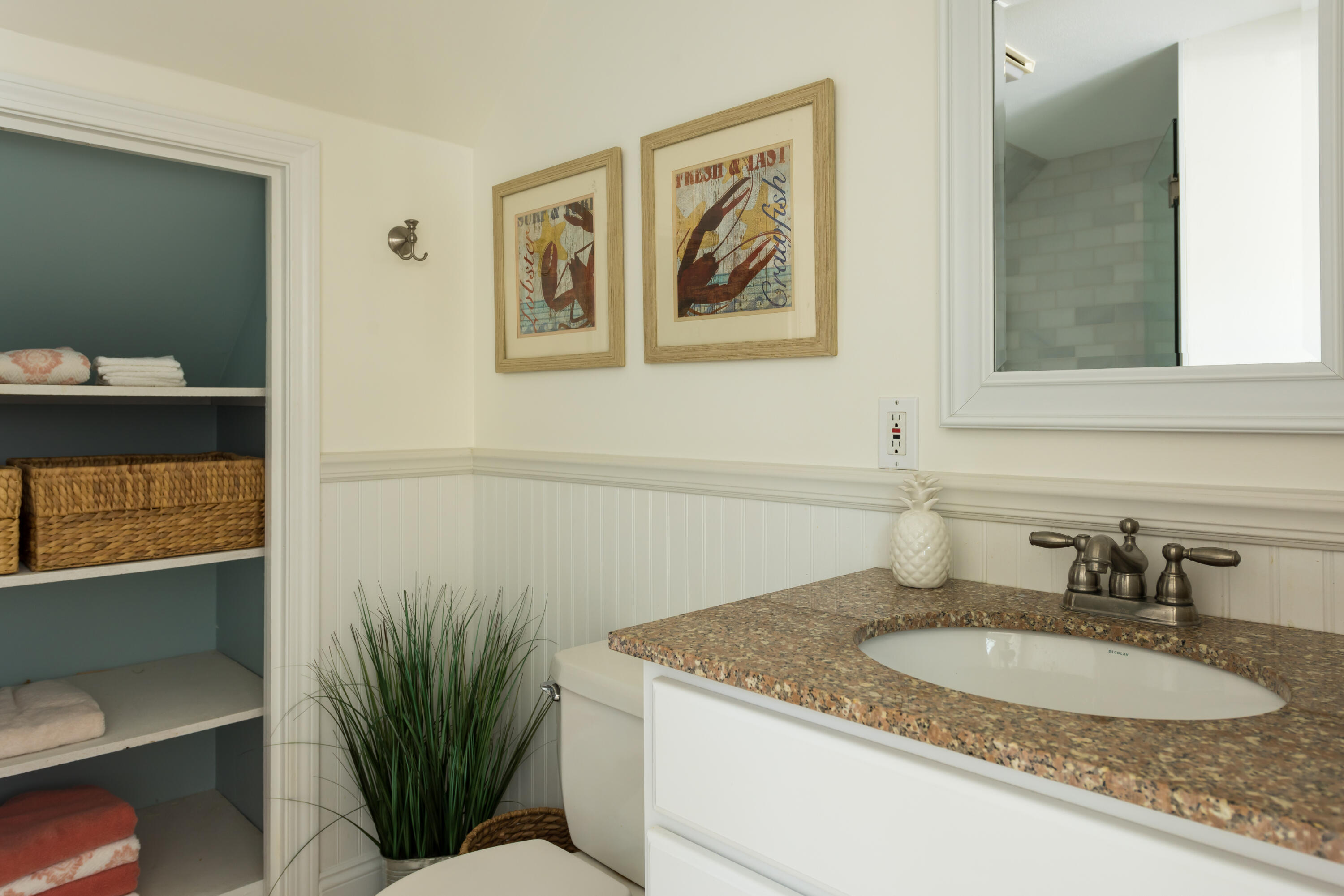 7 Sand Dollar Lane Mashpee, MA 02649 - Photo 21 of 33 a bathroom with a granite countertop sink a mirror and a potted plant