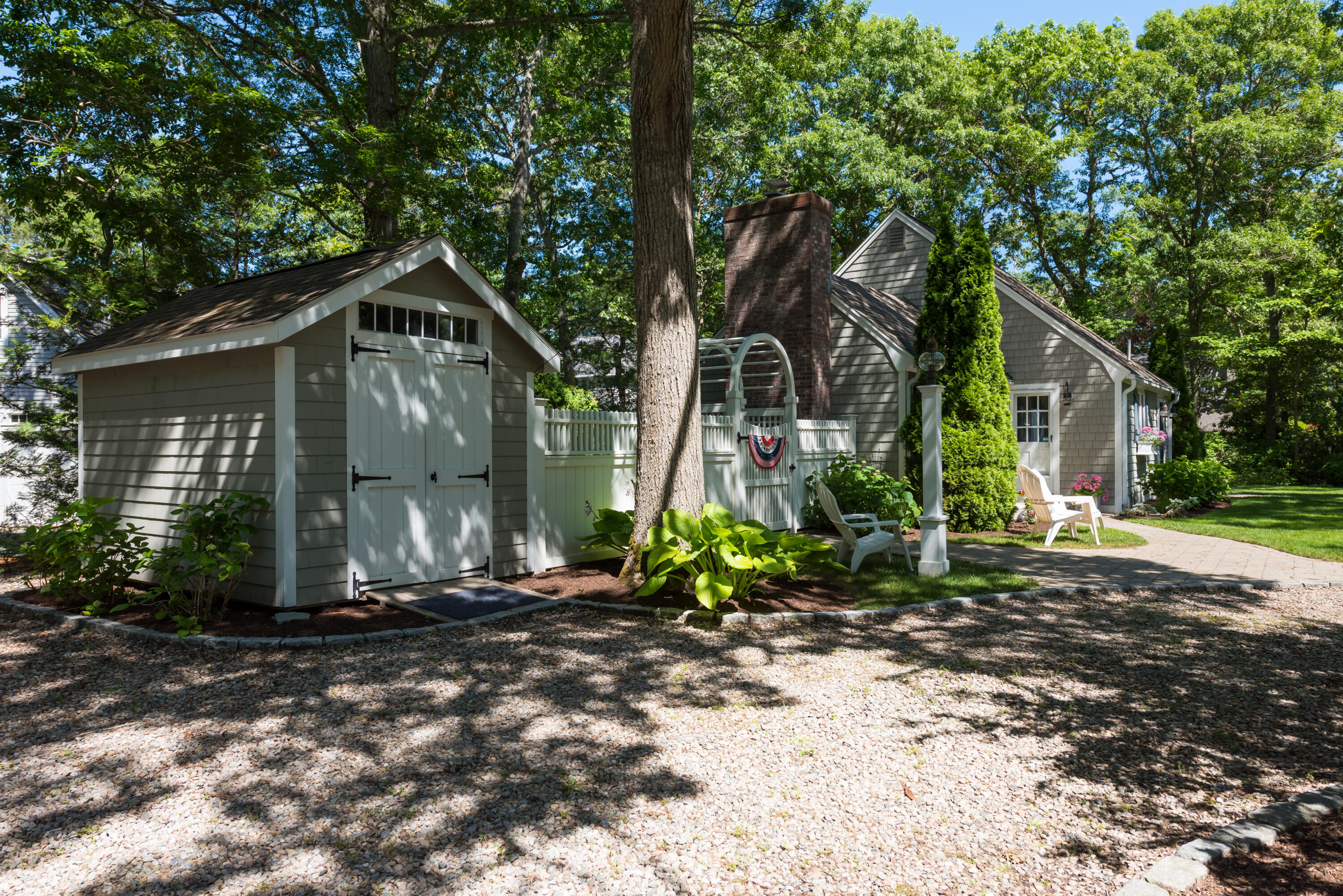 7 Sand Dollar Lane Mashpee, MA 02649 - Photo 6 of 33 a front view of a house with garden