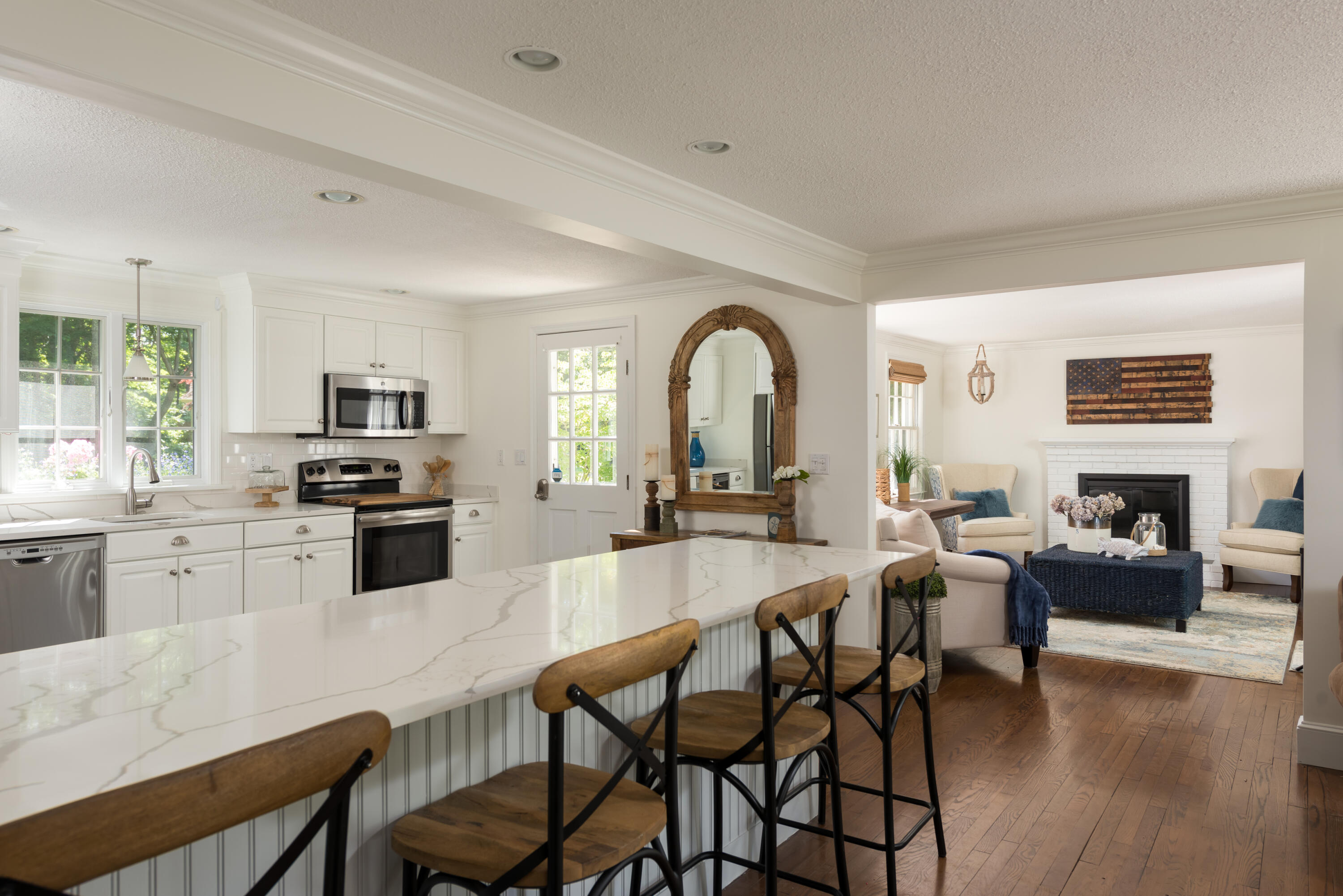 7 Sand Dollar Lane Mashpee, MA 02649 - Photo 8 of 33 a large kitchen with cabinets a sink a counter space and stainless steel appliances