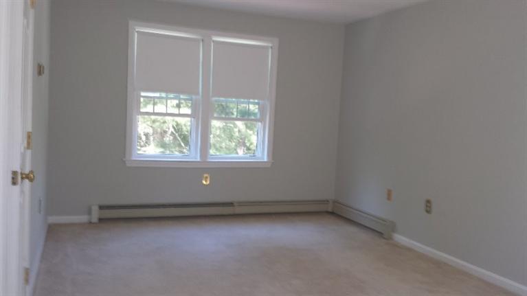 225 Simon Narrows Road Mashpee, MA 02649 - Photo 17 of 22 an empty room with a window