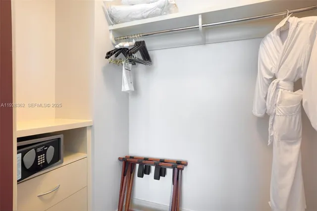 a view of balcony with couple of furniture