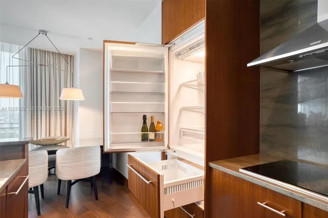 a view of a balcony with chair and table