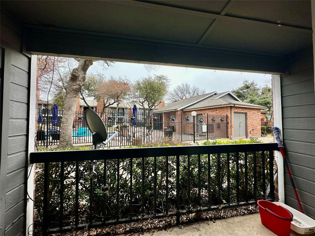18333 Roehampton Drive, Unit 313 Dallas, TX 75252 - Photo 13 of 19 a front view of a building with a window