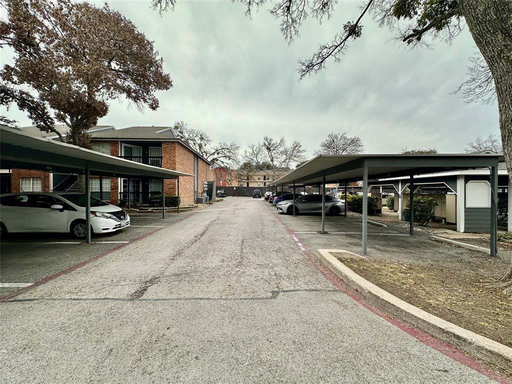 18333 Roehampton Drive, Unit 313 Dallas, TX 75252 - Photo 19 of 19 a view of street with parked cars