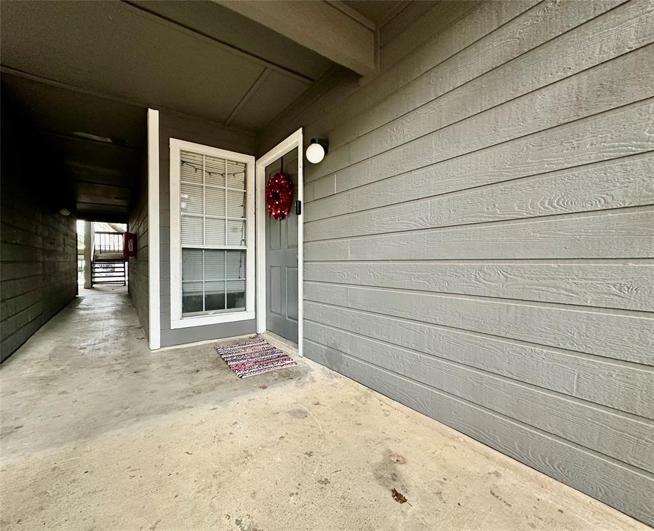 18333 Roehampton Drive, Unit 313 Dallas, TX 75252 - Photo 2 of 19 a view of a door of the house
