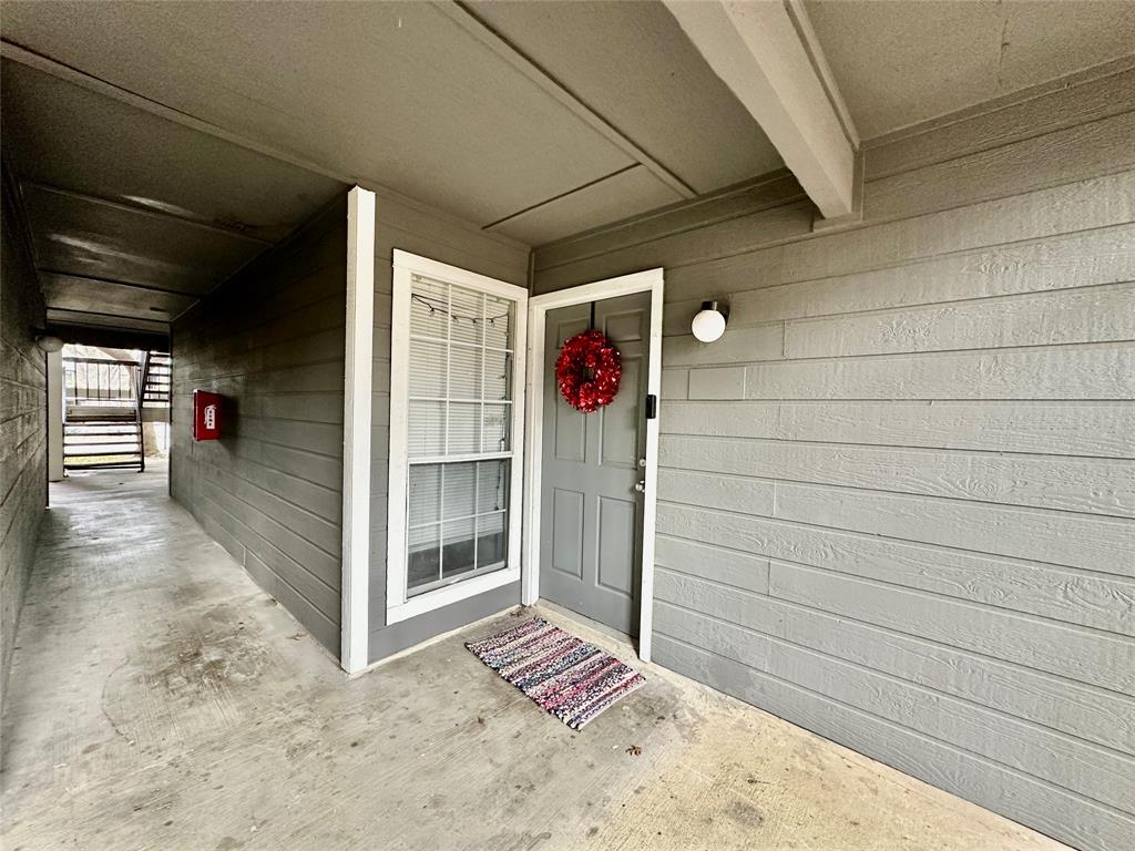 18333 Roehampton Drive, Unit 313 Dallas, TX 75252 - Photo 3 of 19 a view of entryway door