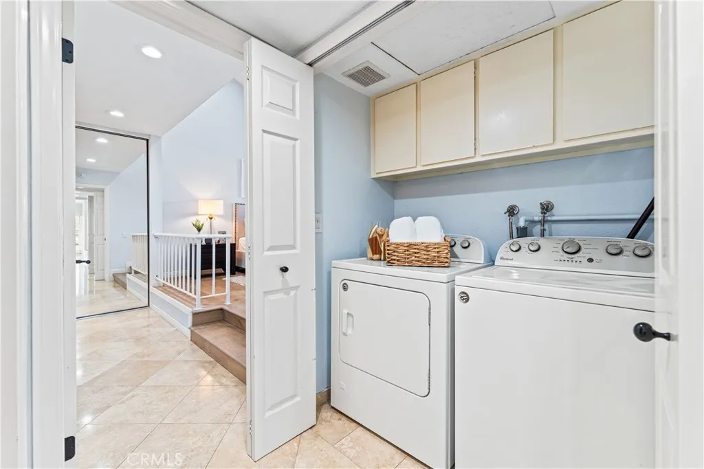 17 Verde, Unit 23 Irvine, CA 92612 - Photo 31 of 52 a kitchen with a sink and cabinets