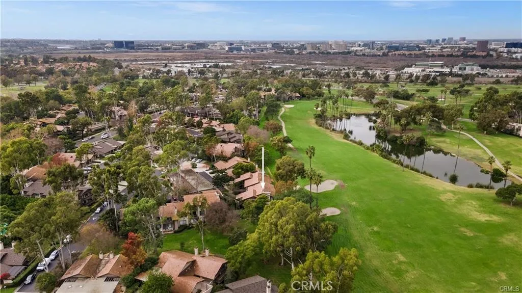 17 Verde, Unit 23 Irvine, CA 92612 - Photo 42 of 52 an aerial view of residential houses with outdoor space and trees