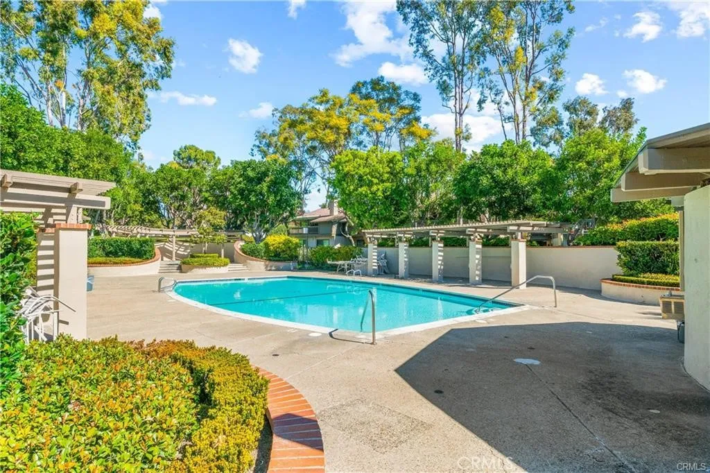 17 Verde, Unit 23 Irvine, CA 92612 - Photo 42 of 50 a view of a swimming pool with a patio