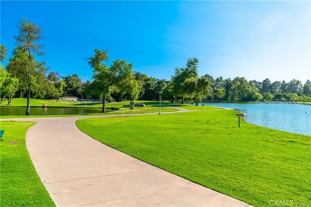 17 Verde, Unit 23 Irvine, CA 92612 - Photo 50 of 52 a view of a golf course with a lake view