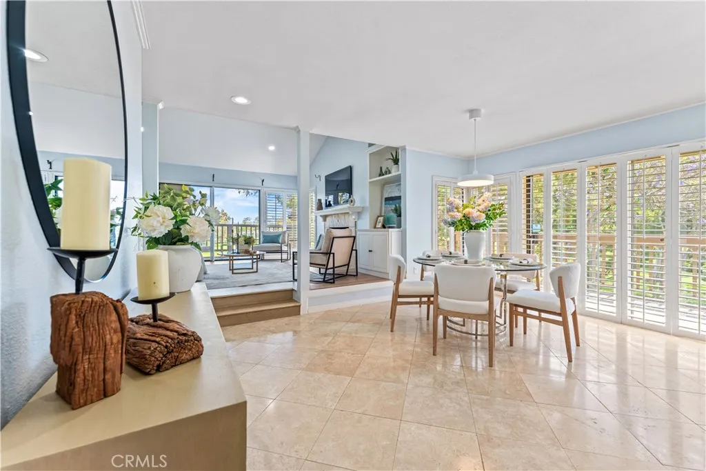 17 Verde, Unit 23 Irvine, CA 92612 - Photo 7 of 52 a living room with furniture and a large window