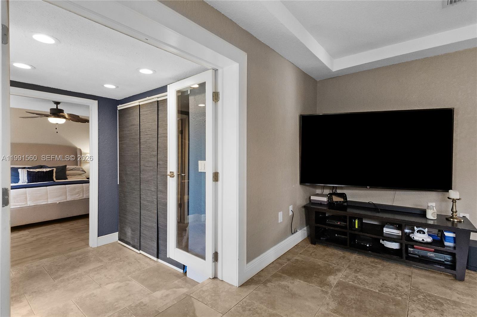3500 Southwest 13th Street Miami, FL 33145 - Photo 12 of 51 a living room with furniture and a flat screen tv