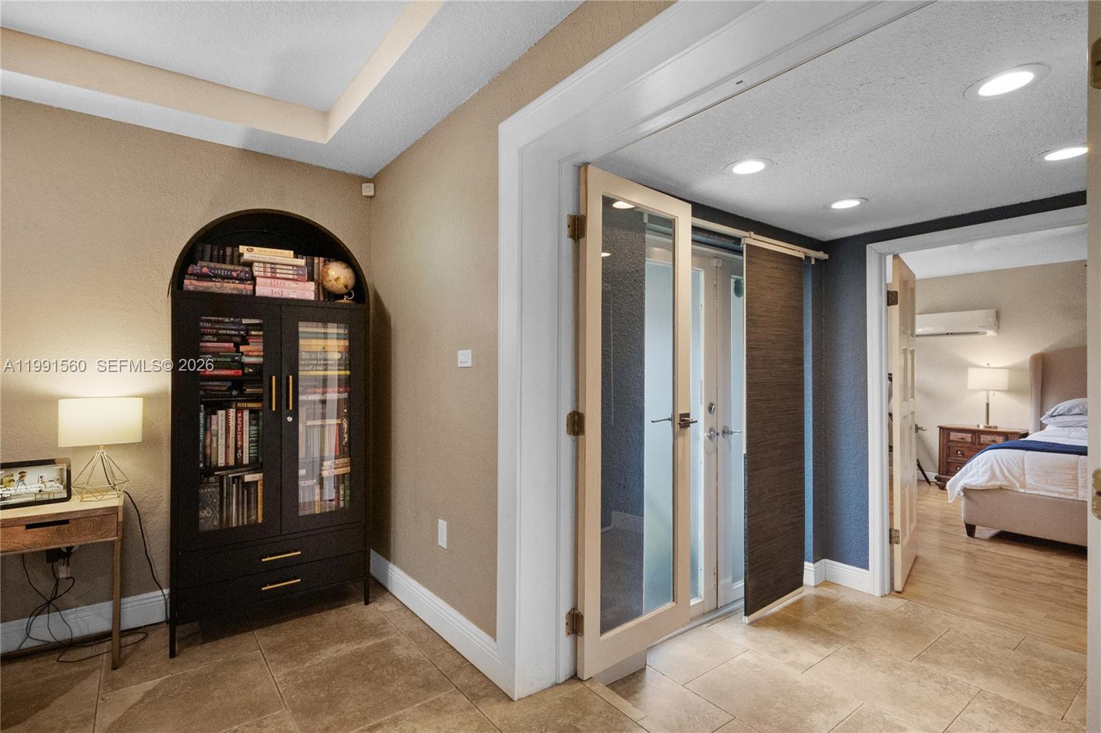 3500 Southwest 13th Street Miami, FL 33145 - Photo 13 of 51 a view of a hallway with a livingroom and a furniture