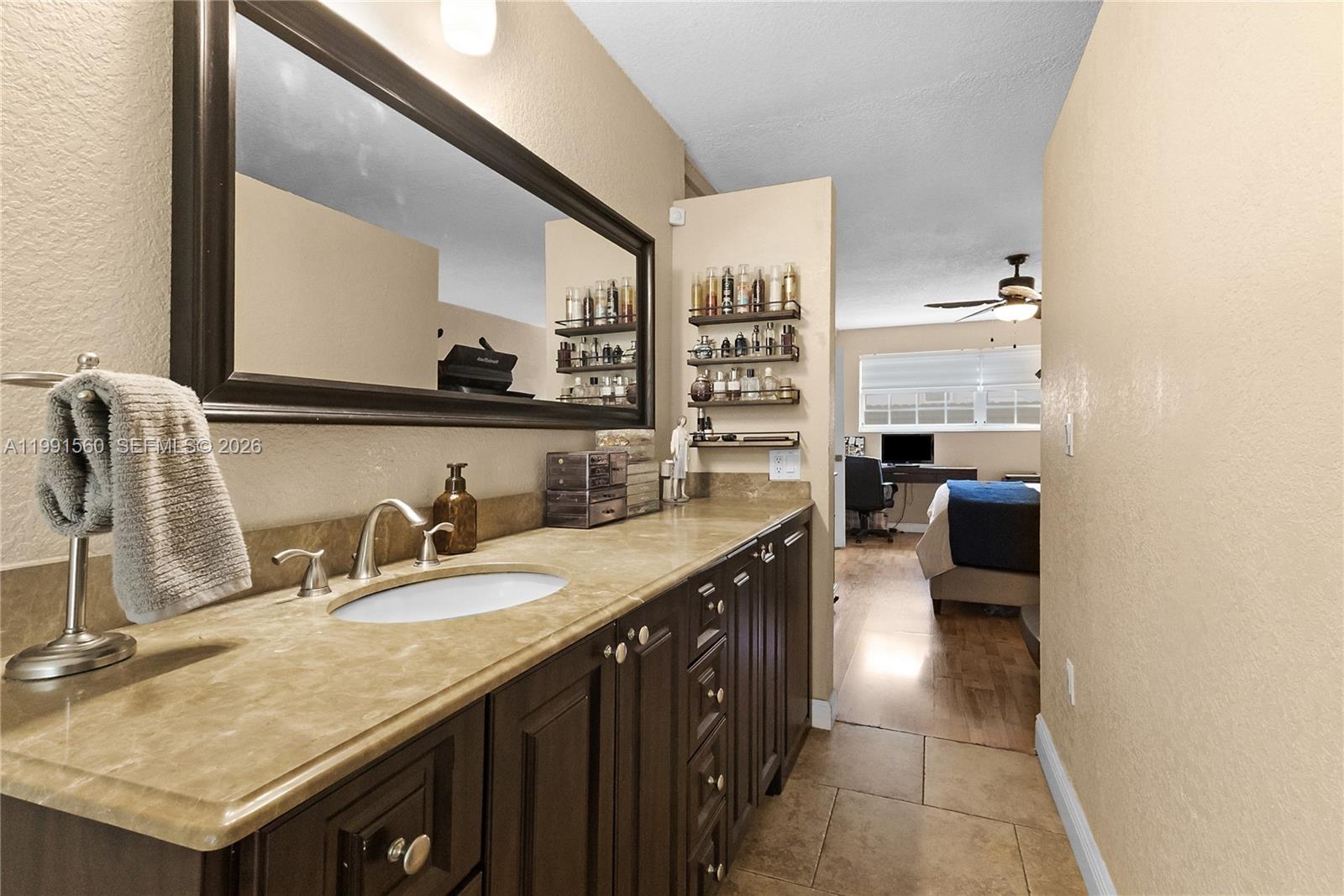 3500 Southwest 13th Street Miami, FL 33145 - Photo 30 of 51 a kitchen with granite countertop a sink a stove and cabinets