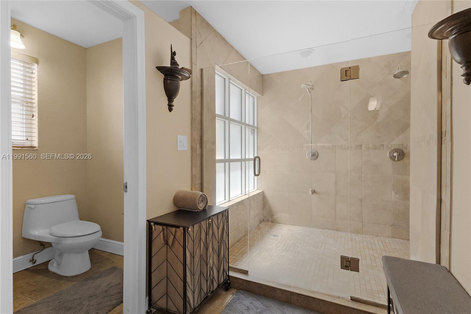 3500 Southwest 13th Street Miami, FL 33145 - Photo 32 of 51 a bathroom with a toilet and a shower