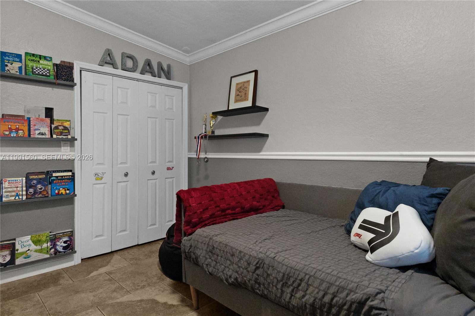 3500 Southwest 13th Street Miami, FL 33145 - Photo 35 of 51 a bedroom with a bed and cabinets