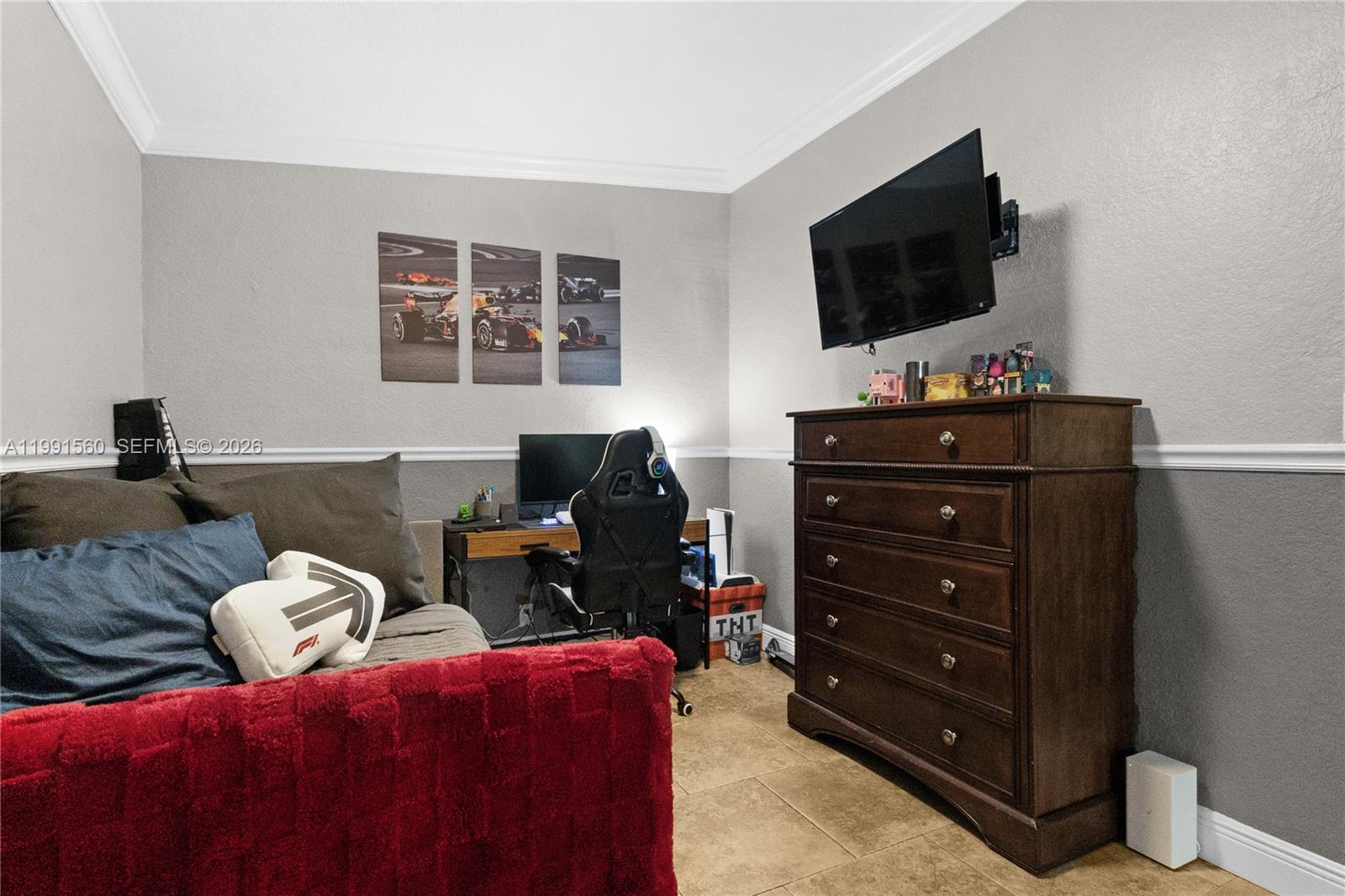 3500 Southwest 13th Street Miami, FL 33145 - Photo 36 of 51 a living room with furniture and a flat screen tv