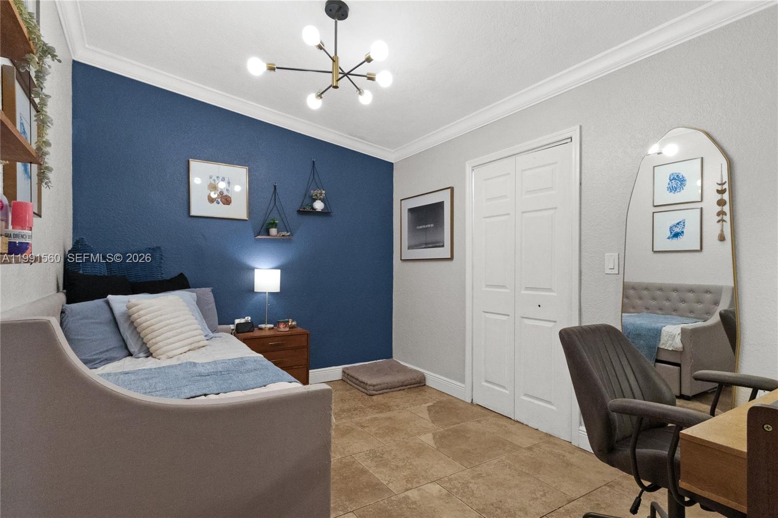 3500 Southwest 13th Street Miami, FL 33145 - Photo 38 of 51 a bedroom with furniture and wooden floor