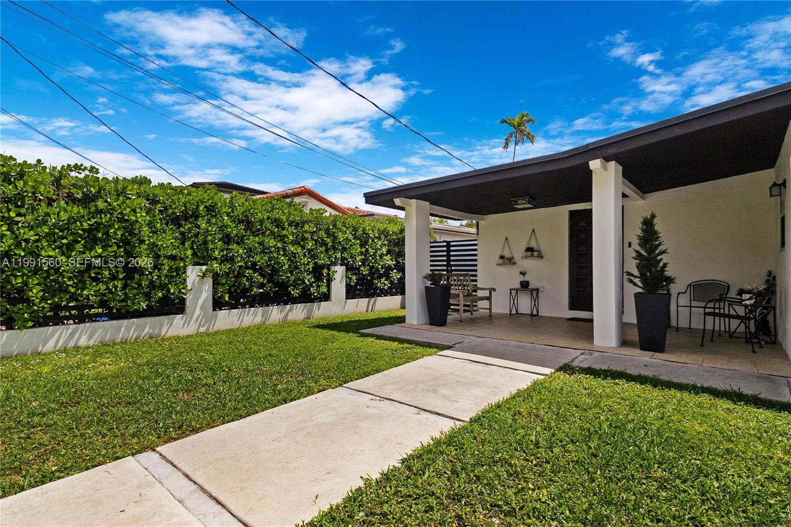 3500 Southwest 13th Street Miami, FL 33145 - Photo 4 of 51 a view of a porch with a backyard