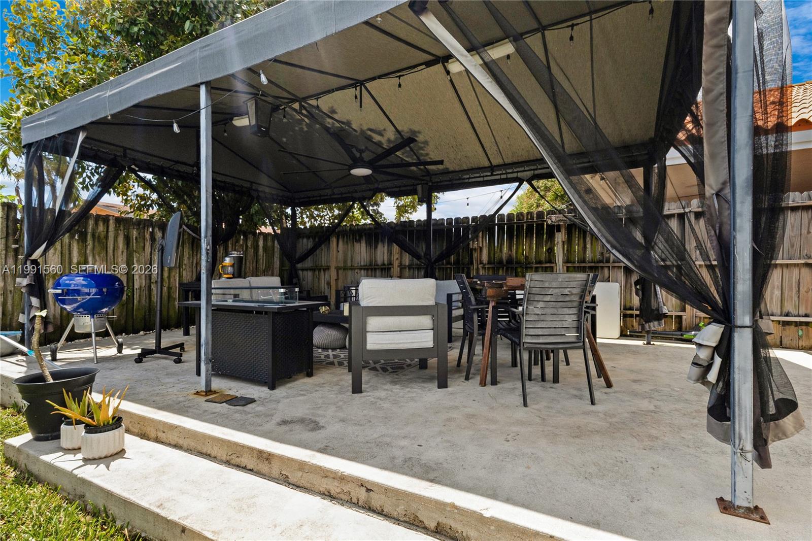 3500 Southwest 13th Street Miami, FL 33145 - Photo 47 of 51 a view of a chairs and table in patio