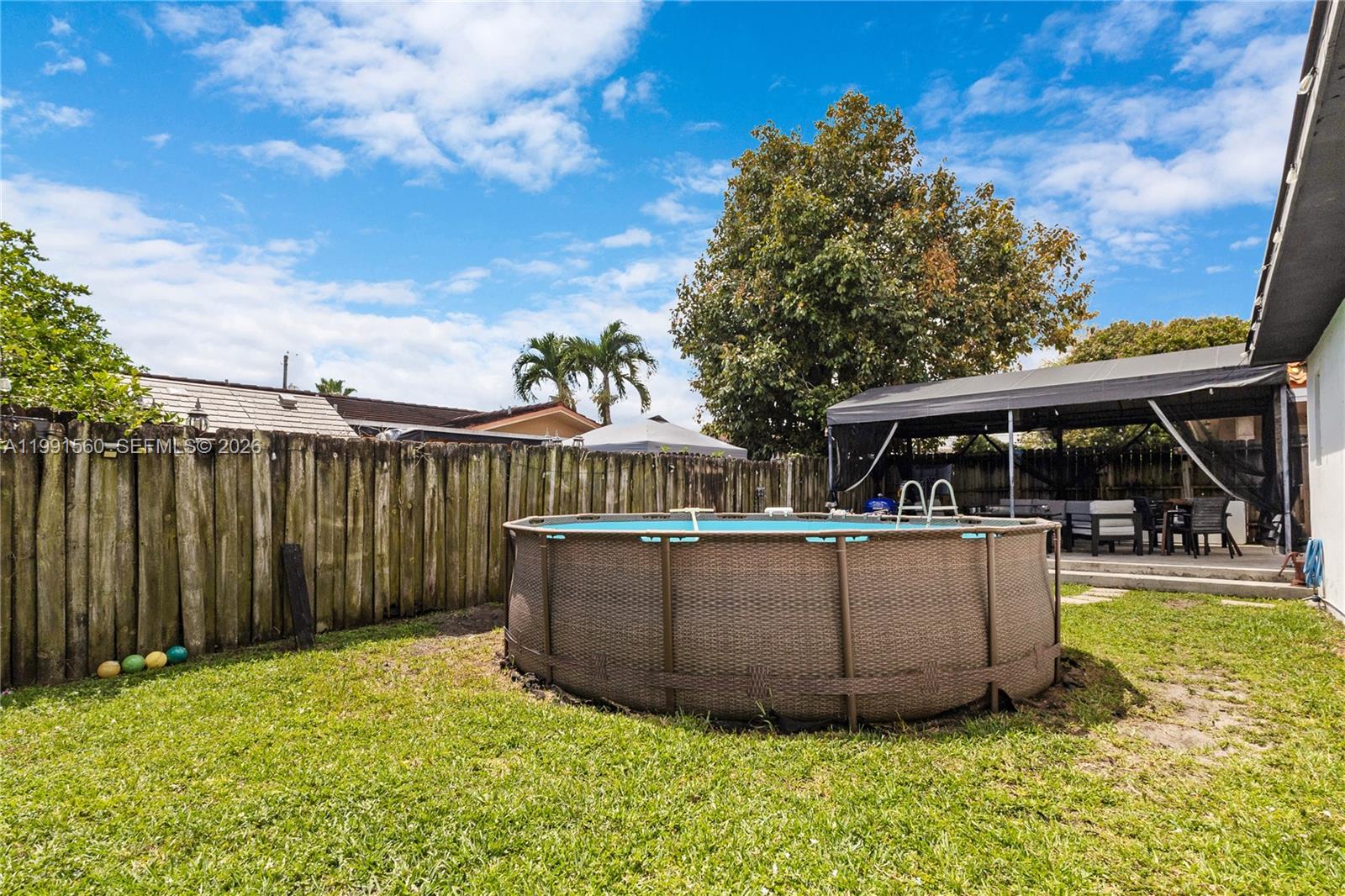 3500 Southwest 13th Street Miami, FL 33145 - Photo 50 of 51 a view of a house with backyard and sitting area