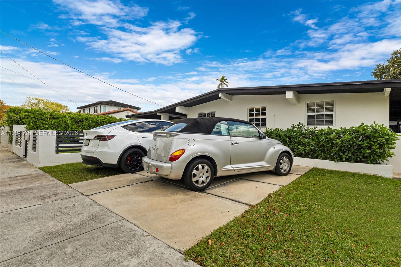 3500 Southwest 13th Street Miami, FL 33145 - Photo 6 of 51 a view of a car parked in front of a house