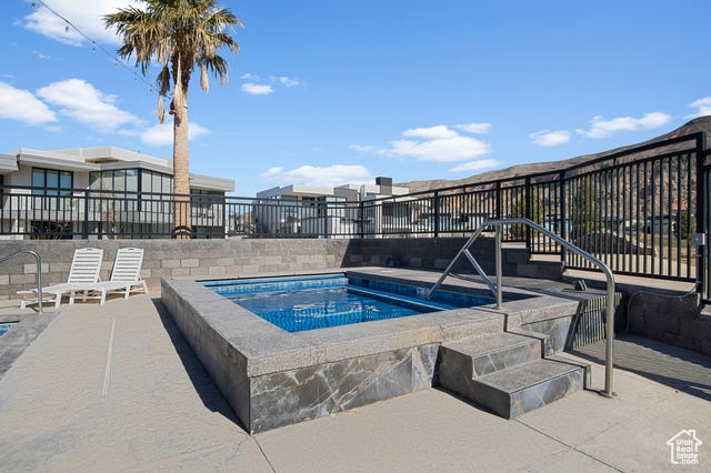 3558 South Cypress Road Hurricane, UT 84737 - Photo 55 of 57 View of pool featuring a hot tub and a patio