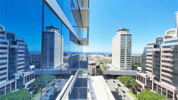 a view of balcony with wooden floor and city view